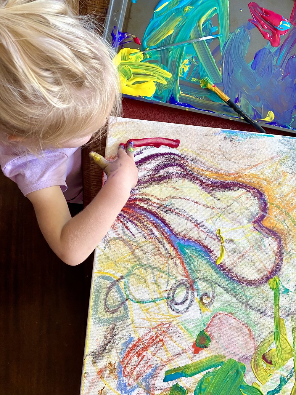 Girl Using finger paints